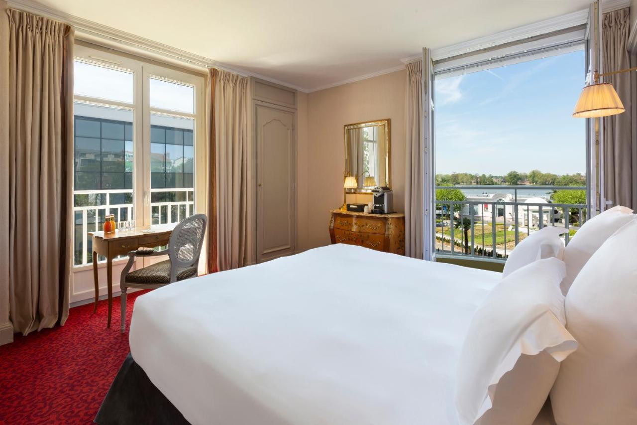 Deluxe Room balcony Lake Side Casino & Spa Access,1310779945:JPEG