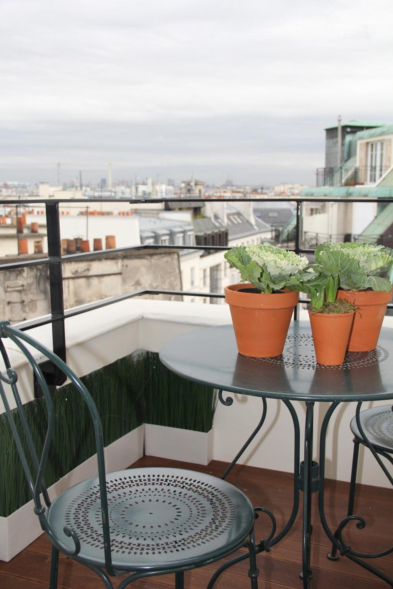Deluxe Room Rooftop View on balcony