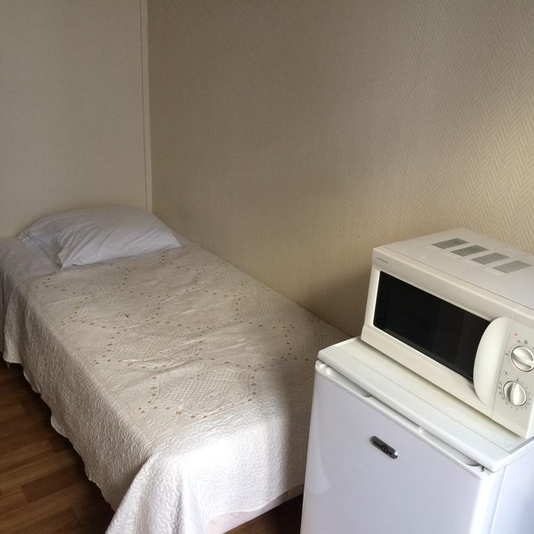 Quarto Individual com Casa de Banho Partilhada