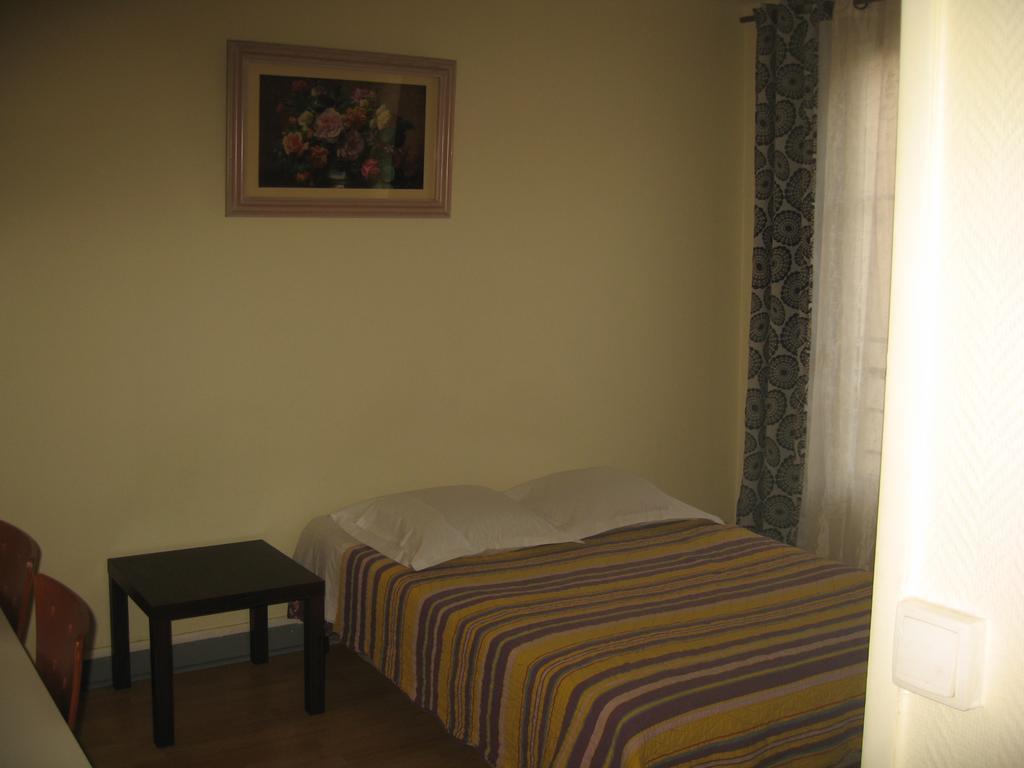 Quarto Twin com Casa de Banho Partilhada