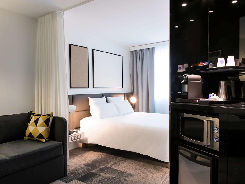 Suíte Executiva com Cama Queen-size e Sofá